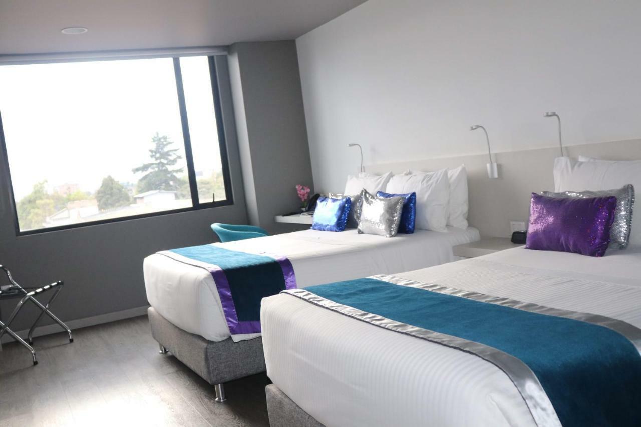 Kamer met 2 Queensize Bedden